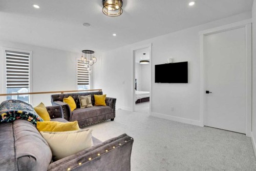 103 Sandpiper Park, Chestermere, AB - Indoor Photo Showing Living Room