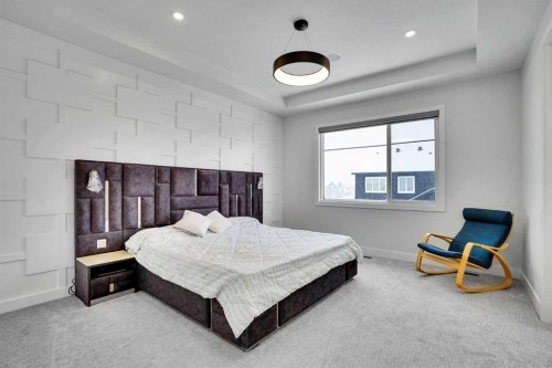 103 Sandpiper Park, Chestermere, AB - Indoor Photo Showing Bedroom