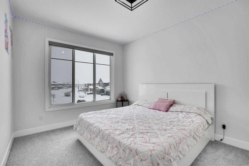 103 Sandpiper Park, Chestermere, AB - Indoor Photo Showing Bedroom