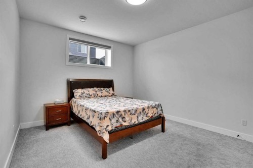 103 Sandpiper Park, Chestermere, AB - Indoor Photo Showing Bedroom