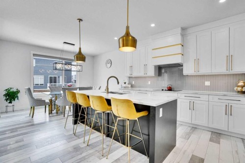 103 Sandpiper Park, Chestermere, AB - Indoor Photo Showing Kitchen With Upgraded Kitchen