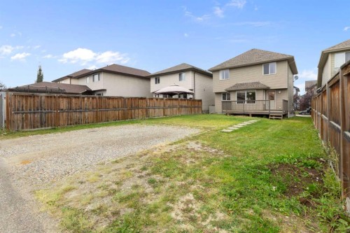 221 Prestwick Terrace Se, Calgary, AB - Outdoor With Deck Patio Veranda With Backyard With Exterior