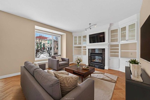 3 Hampstead Hill Nw, Calgary, AB - Indoor Photo Showing Living Room With Fireplace