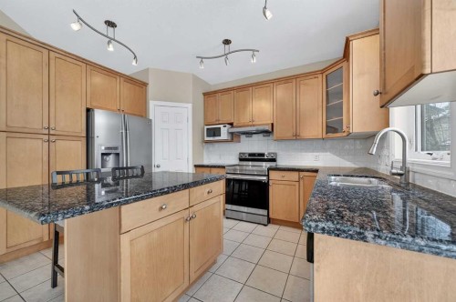 3 Hampstead Hill Nw, Calgary, AB - Indoor Photo Showing Kitchen With Double Sink