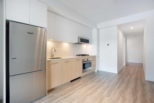 214-730 2Nd Avenue Sw, Calgary, AB - Indoor Photo Showing Kitchen With Upgraded Kitchen