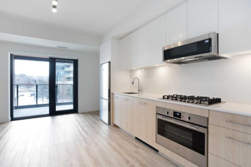 214-730 2Nd Avenue Sw, Calgary, AB - Indoor Photo Showing Kitchen With Upgraded Kitchen