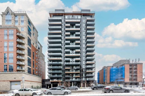 214-730 2Nd Avenue Sw, Calgary, AB - Outdoor With Balcony With Facade