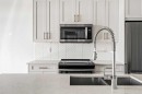 407-300 Auburn Meadows Common Se, Calgary, AB  - Indoor Photo Showing Kitchen With Stainless Steel Kitchen With Double Sink With Upgraded Kitchen 