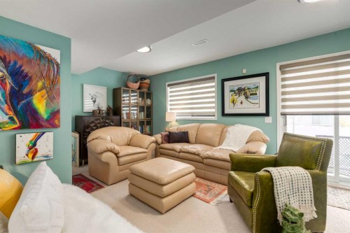 318 Hawkstone Manor Nw, Calgary, AB - Indoor Photo Showing Living Room