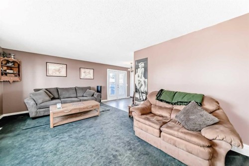 148 Huntridge Road Ne, Calgary, AB - Indoor Photo Showing Living Room