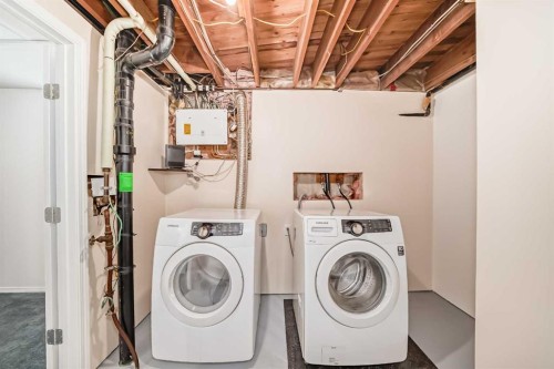148 Huntridge Road Ne, Calgary, AB - Indoor Photo Showing Laundry Room