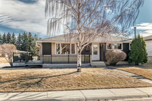 148 Huntridge Road Ne, Calgary, AB - Outdoor With Deck Patio Veranda