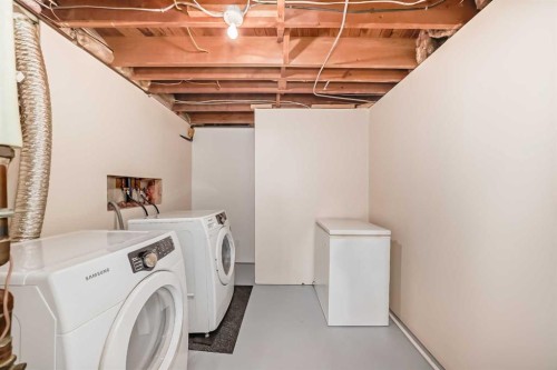 148 Huntridge Road Ne, Calgary, AB - Indoor Photo Showing Laundry Room