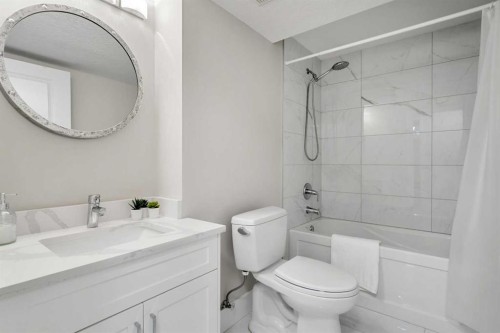 16 Midcrest Rise Se, Calgary, AB - Indoor Photo Showing Bathroom