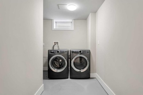16 Midcrest Rise Se, Calgary, AB - Indoor Photo Showing Laundry Room