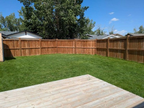 16 Midcrest Rise Se, Calgary, AB - Outdoor With Deck Patio Veranda With Backyard