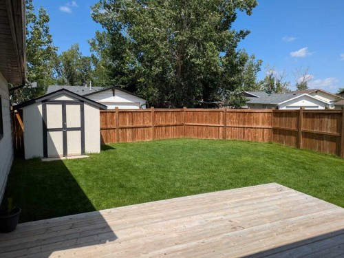 16 Midcrest Rise Se, Calgary, AB - Outdoor With Deck Patio Veranda With Backyard