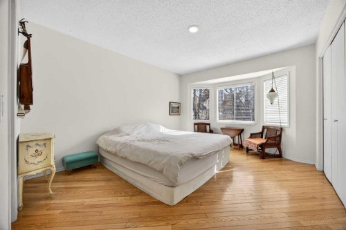 100 Strathcona Close Sw, Calgary, AB - Indoor Photo Showing Bedroom