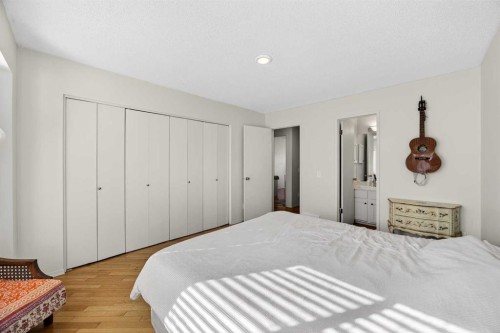 100 Strathcona Close Sw, Calgary, AB - Indoor Photo Showing Bedroom