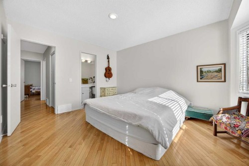 100 Strathcona Close Sw, Calgary, AB - Indoor Photo Showing Bedroom