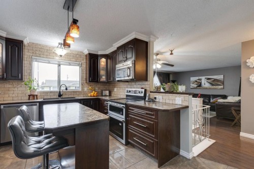 299 Doverview Crescent Se, Calgary, AB - Indoor Photo Showing Kitchen With Upgraded Kitchen