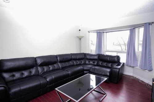 52 Templeby Way Ne, Calgary, AB - Indoor Photo Showing Living Room
