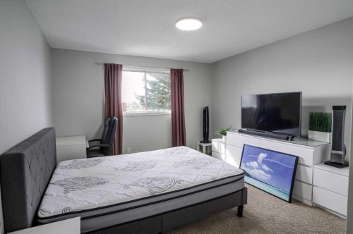 52 Templeby Way Ne, Calgary, AB - Indoor Photo Showing Bedroom