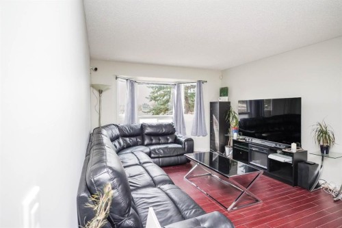 52 Templeby Way Ne, Calgary, AB - Indoor Photo Showing Living Room