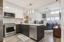 1402-95 Burma Star Road Sw, Calgary, AB  - Indoor Photo Showing Kitchen With Double Sink 