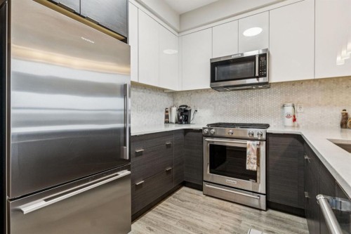 1402-95 Burma Star Road Sw, Calgary, AB - Indoor Photo Showing Kitchen With Upgraded Kitchen