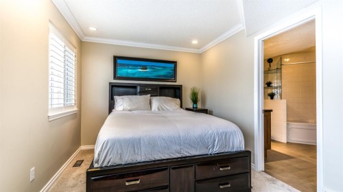 904 Patterson View Sw, Calgary, AB - Indoor Photo Showing Bedroom
