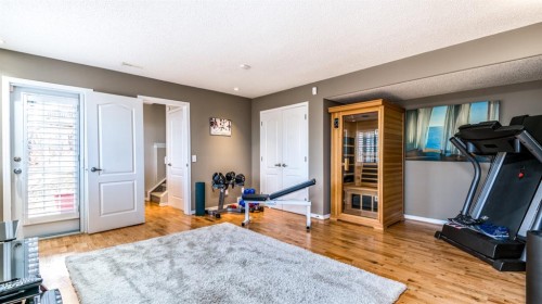 904 Patterson View Sw, Calgary, AB - Indoor Photo Showing Gym Room