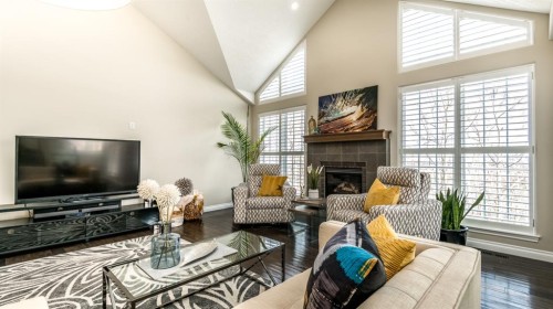 904 Patterson View Sw, Calgary, AB - Indoor Photo Showing Living Room With Fireplace