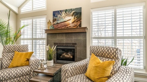 904 Patterson View Sw, Calgary, AB - Indoor Photo Showing Living Room With Fireplace