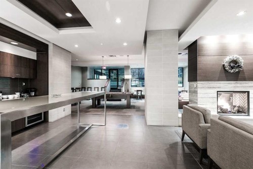 650-222 Riverfront Avenue Sw, Calgary, AB - Indoor With Fireplace