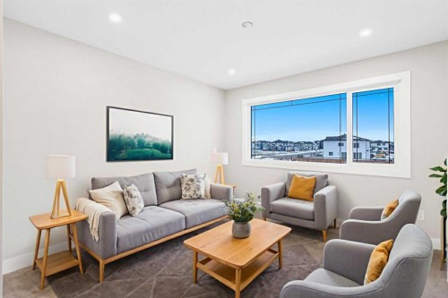 56 Bridges Drive, Langdon, AB - Indoor Photo Showing Living Room
