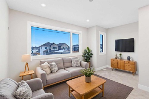 56 Bridges Drive, Langdon, AB - Indoor Photo Showing Living Room