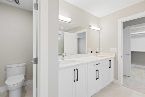 56 Bridges Drive, Langdon, AB - Indoor Photo Showing Bathroom