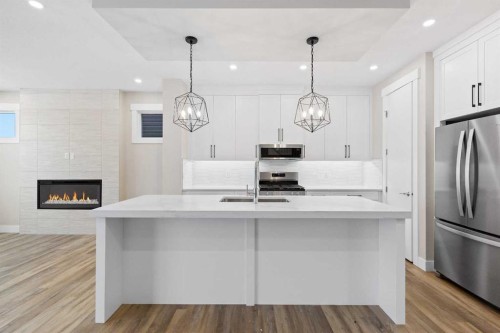 56 Bridges Drive, Langdon, AB - Indoor Photo Showing Kitchen With Upgraded Kitchen