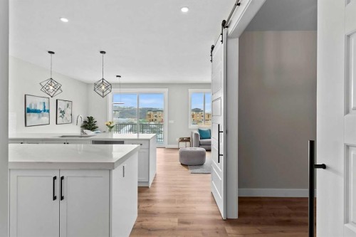 160 Vantage Drive, Cochrane, AB - Indoor Photo Showing Kitchen