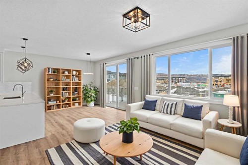 160 Vantage Drive, Cochrane, AB - Indoor Photo Showing Living Room