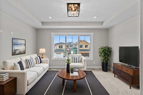 160 Vantage Drive, Cochrane, AB - Indoor Photo Showing Living Room