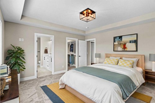 160 Vantage Drive, Cochrane, AB - Indoor Photo Showing Bedroom