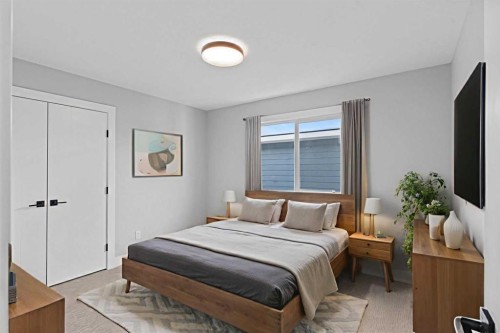 157 Vantage Drive, Cochrane, AB - Indoor Photo Showing Bedroom