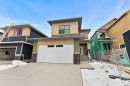 157 Vantage Drive, Cochrane, AB  - Outdoor With Facade 