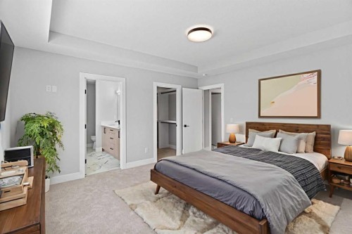 157 Vantage Drive, Cochrane, AB - Indoor Photo Showing Bedroom