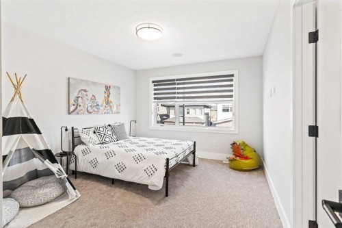 16 Sunvalley View, Cochrane, AB - Indoor Photo Showing Bedroom