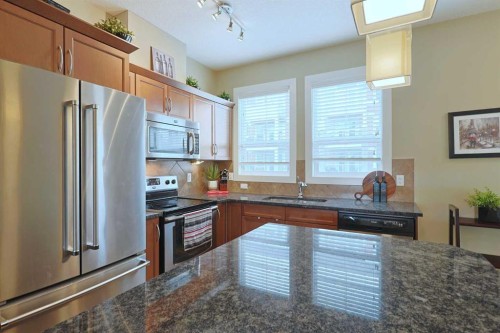 505 Evanston Square Nw, Calgary, AB - Indoor Photo Showing Kitchen With Stainless Steel Kitchen