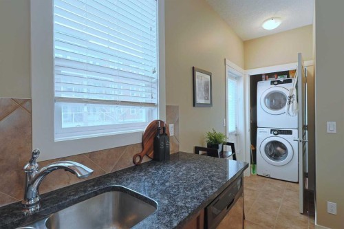 505 Evanston Square Nw, Calgary, AB - Indoor Photo Showing Laundry Room