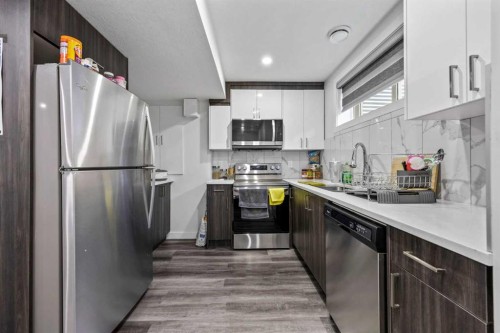 9121 52 Street Ne, Calgary, AB - Indoor Photo Showing Kitchen With Double Sink With Upgraded Kitchen